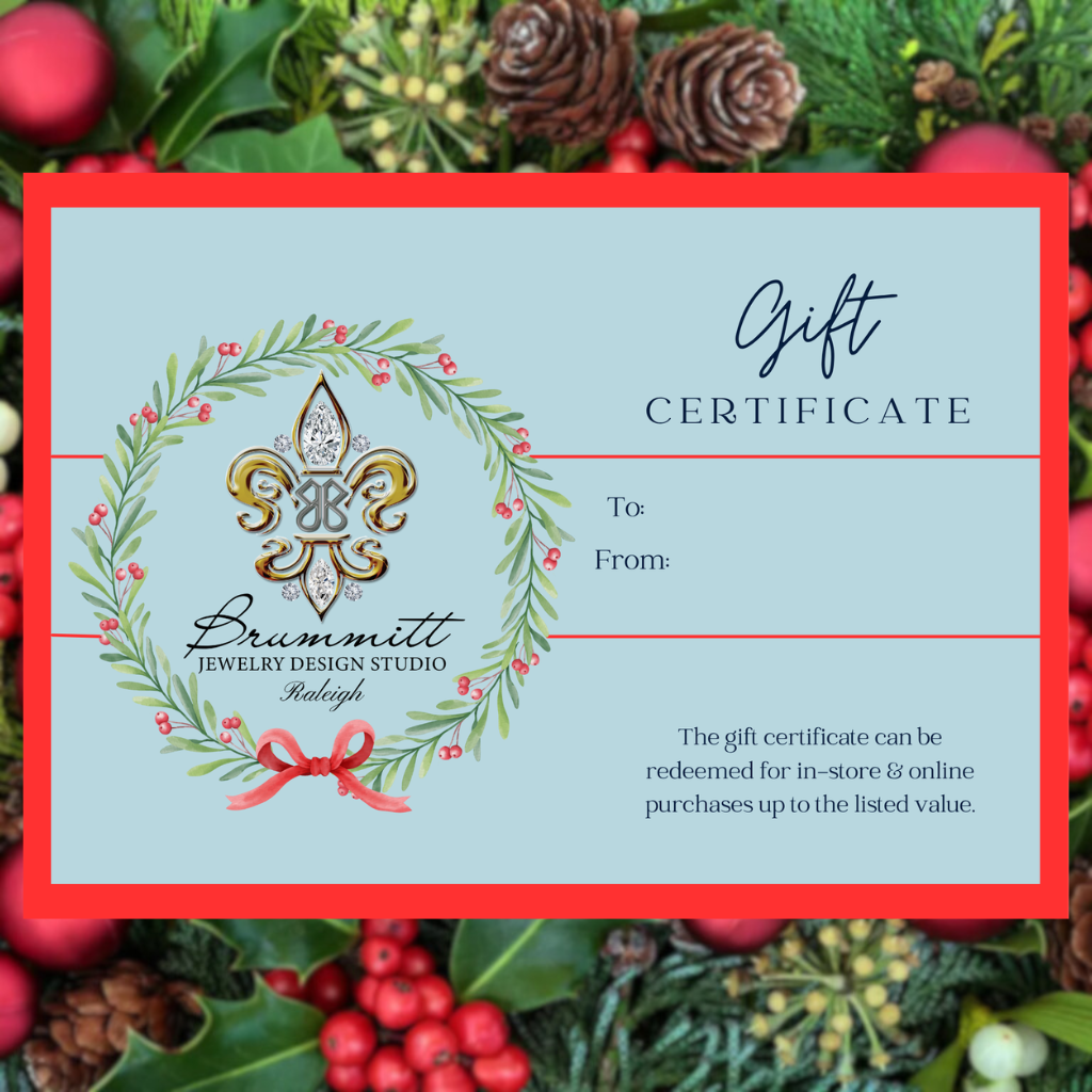 Gift certificate from Brummitt Jewelry Design Studio with decorative wreath and bow on a festive background.