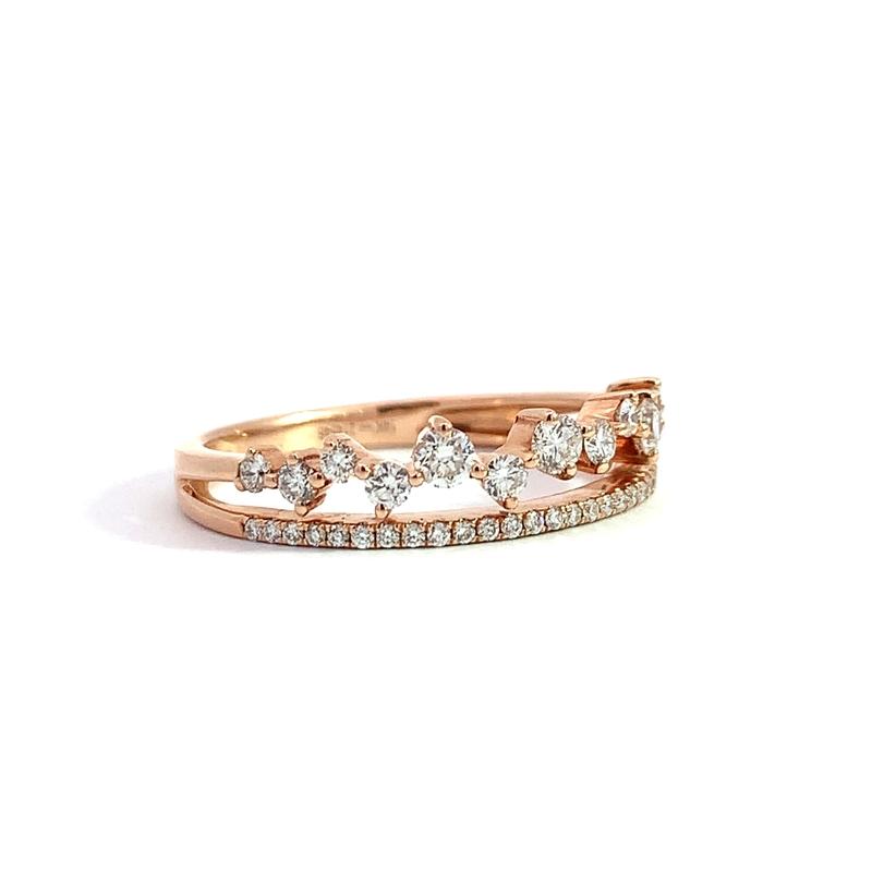 photo of a rose gold two row diamond band on a white background