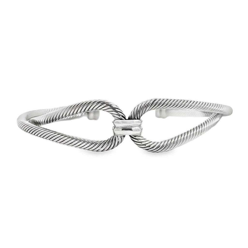 photo of a silver twisted wire cuff on a white background